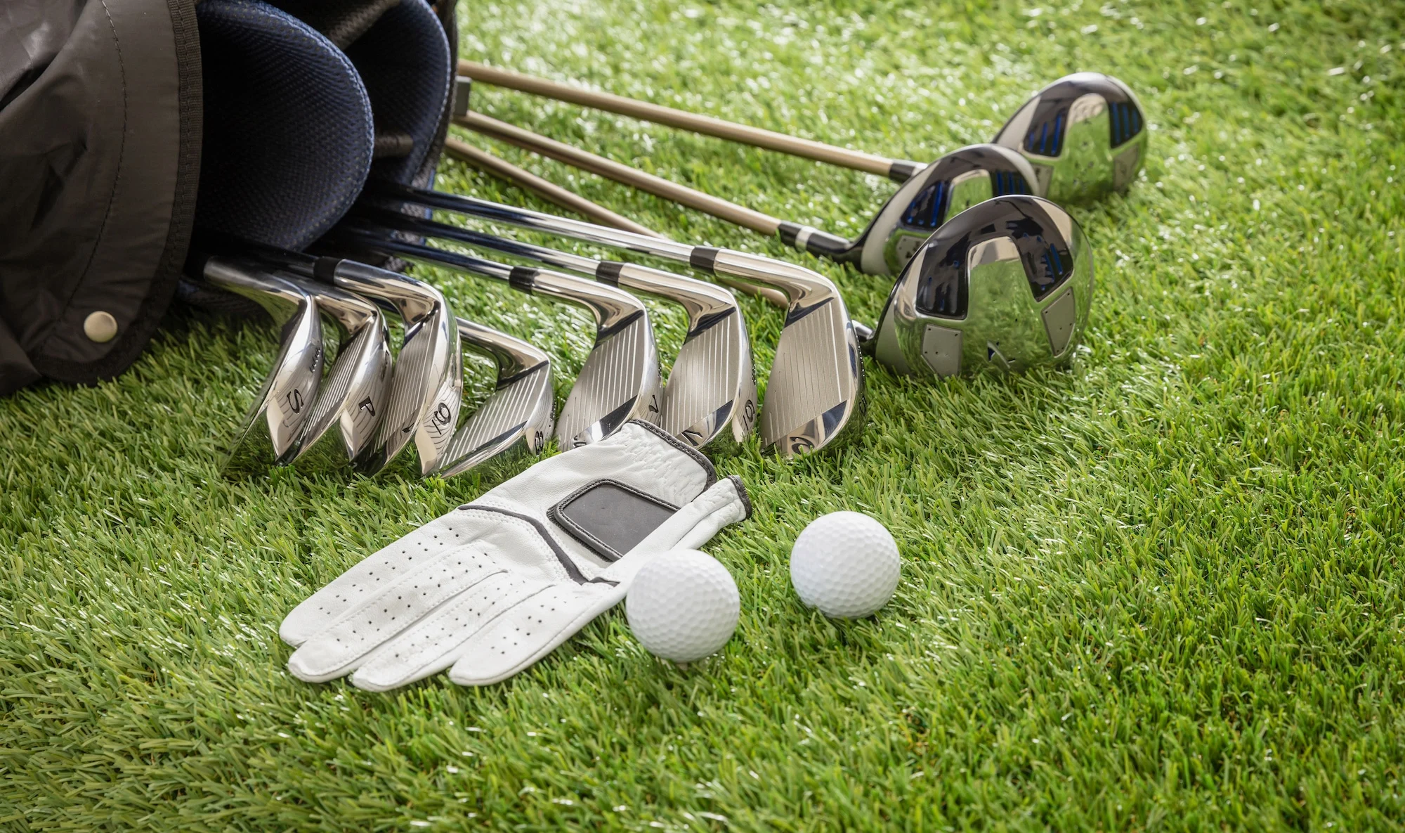 Golf Pro Shop -Golf Pro Shop golf equipment on green grass golf course close u 2021 04 05 12 46 58 utc